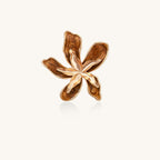Gold-plated brass ring with 5 curved petals forming a dimensional flower design on white background.