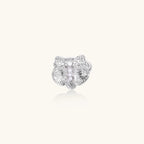 Silver-toned orchid ring with textured petals, pearl center accents, and sparkling zirconia stones on white background.
