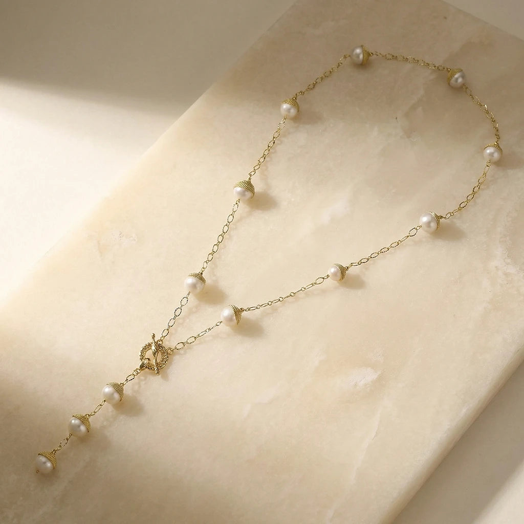 Pearl Garden Necklace on a stone slab
