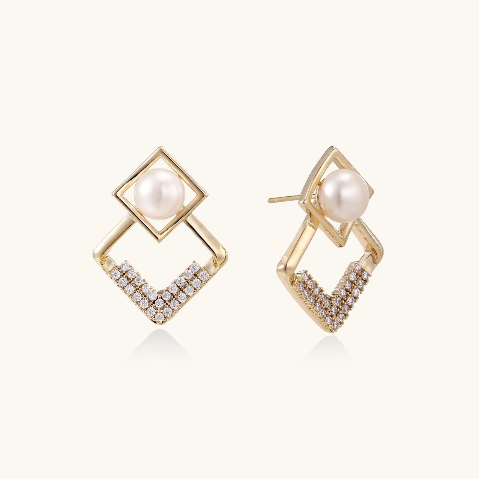 geometric Gold earrings with pearls and small diamonds on a white background
