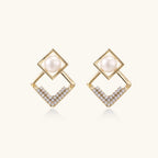 geometric Gold earrings with pearls and small diamonds on a white background