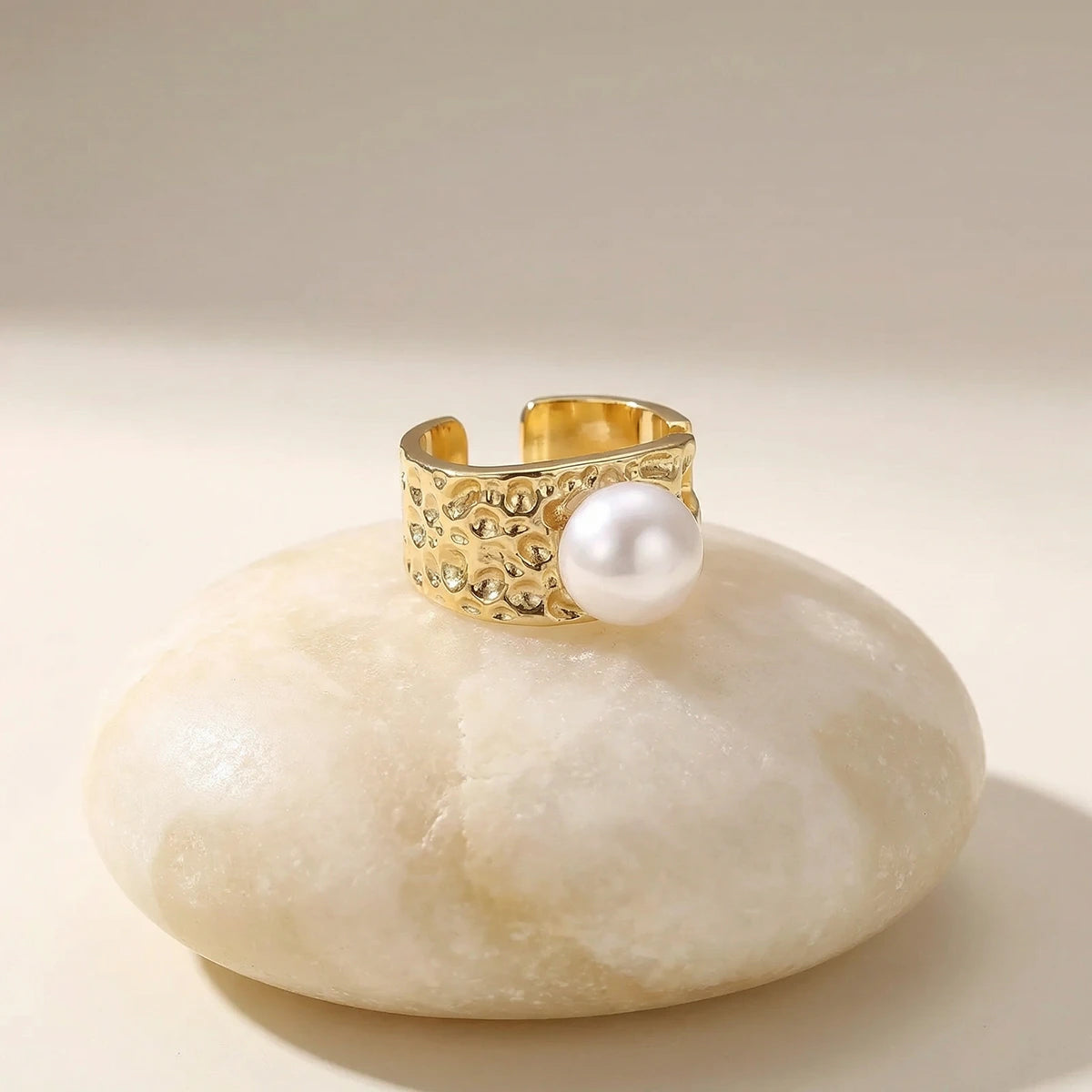 Hammered Pearl Cuff Ring on a stone