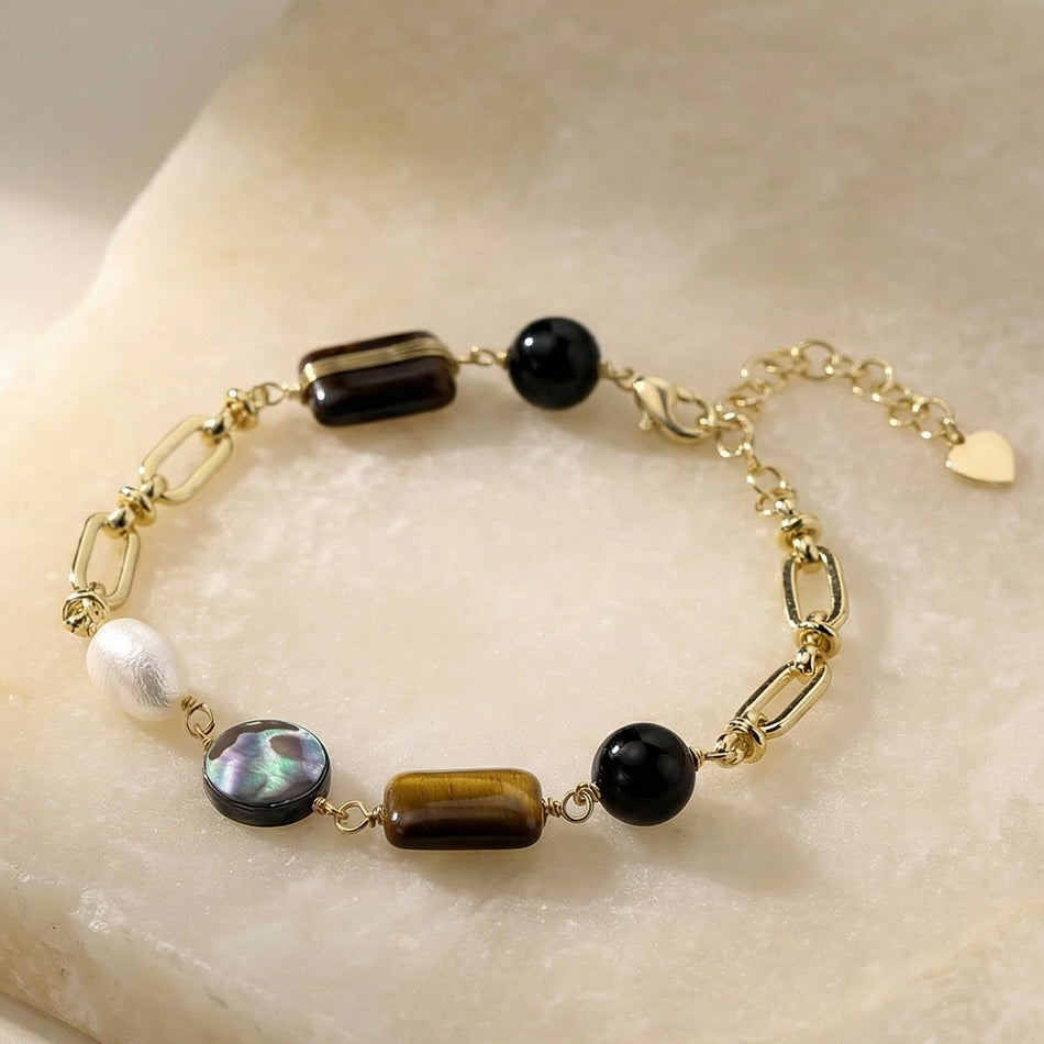 Tiger’s eye, obsidian, abalone, and pearl bracelet