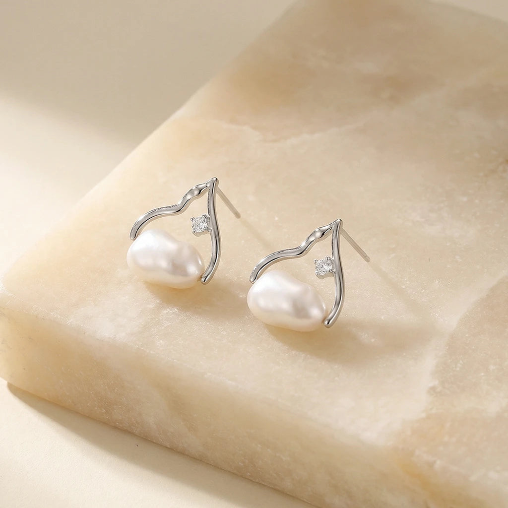Summit Pearl Stud Earrings On stone